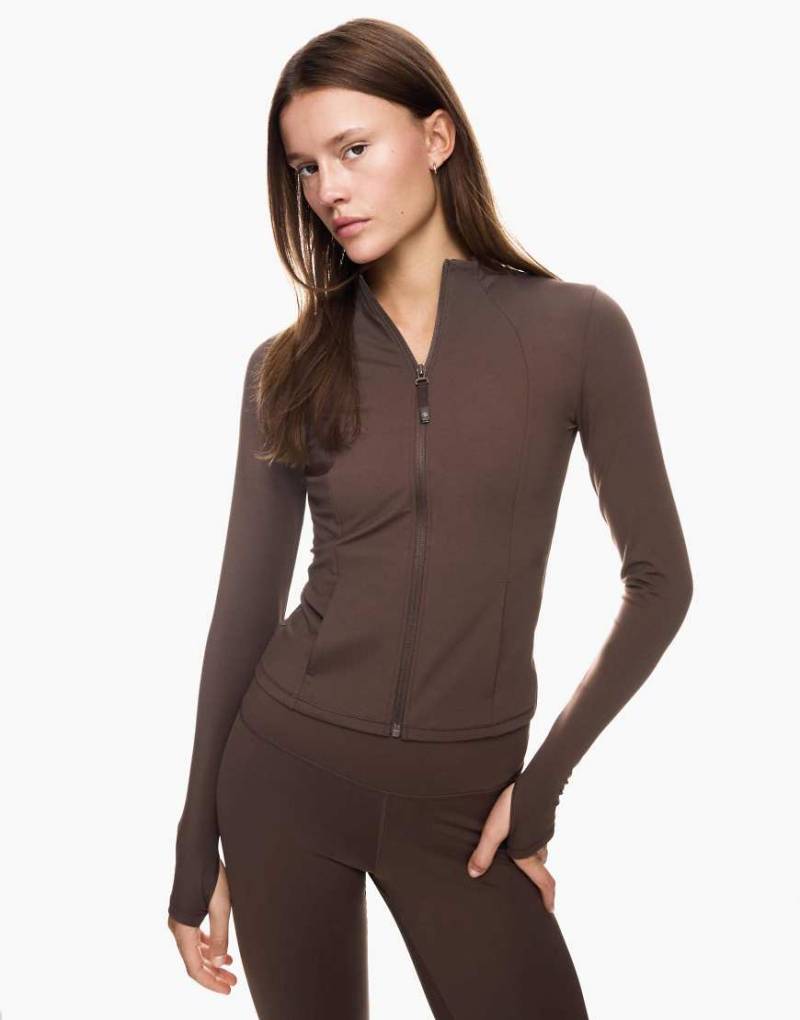 Bershka - Schnelltrocknende und atmungsaktive Jacke in Braun mit Reißverschluss-Brown Bershka - Schnelltrocknende und atmungsaktive Jacke in Braun mit Reißverschluss-Brown von Bershka