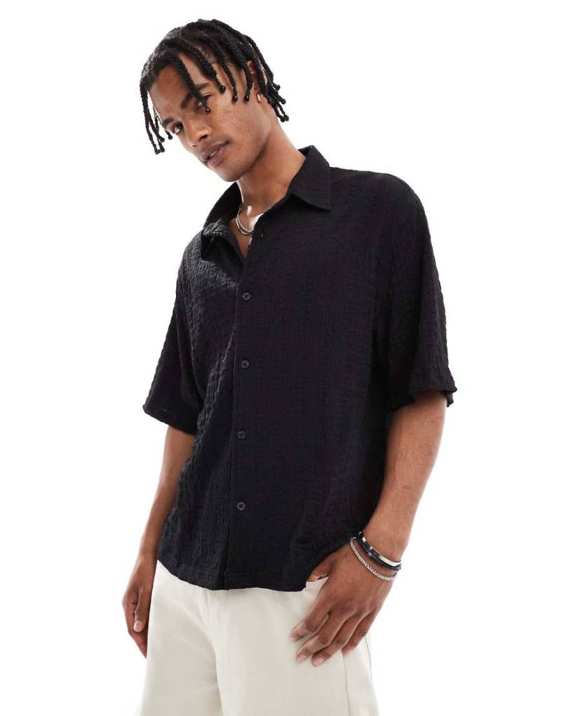 Bershka - Strukturiertes Strick-Hemd in Schwarz Bershka - Strukturiertes Strick-Hemd in Schwarz von Bershka