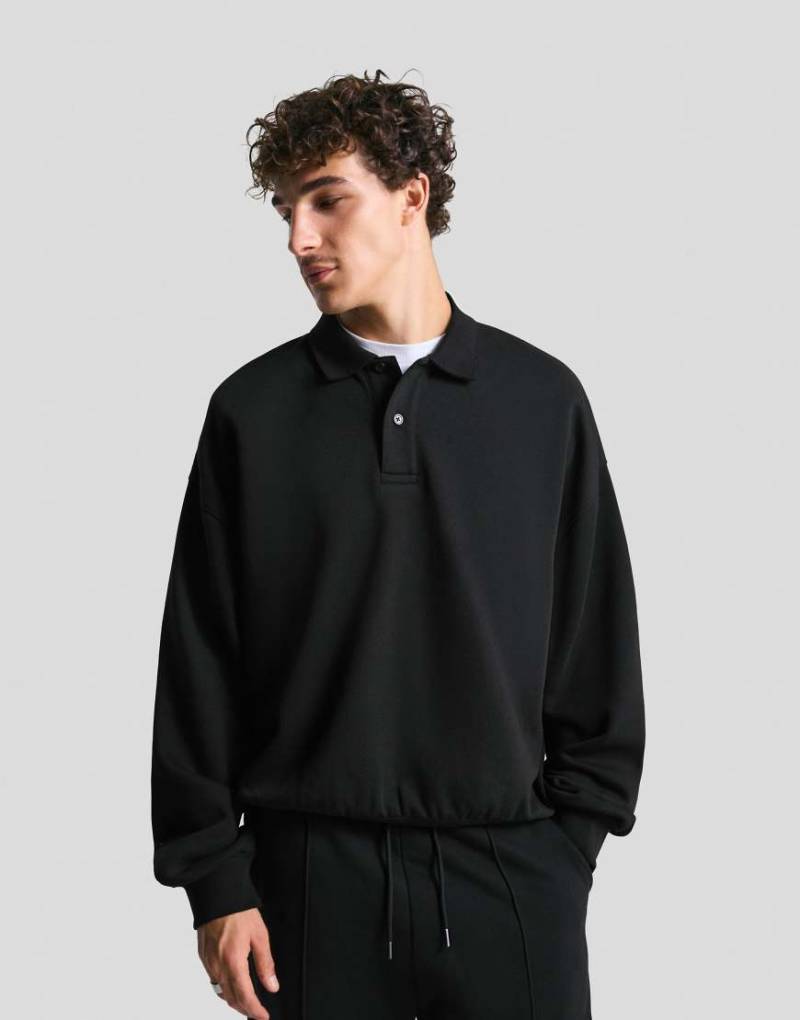 Bershka - Sweatshirt in Schwarz mit Polokragen Bershka - Sweatshirt in Schwarz mit Polokragen von Bershka