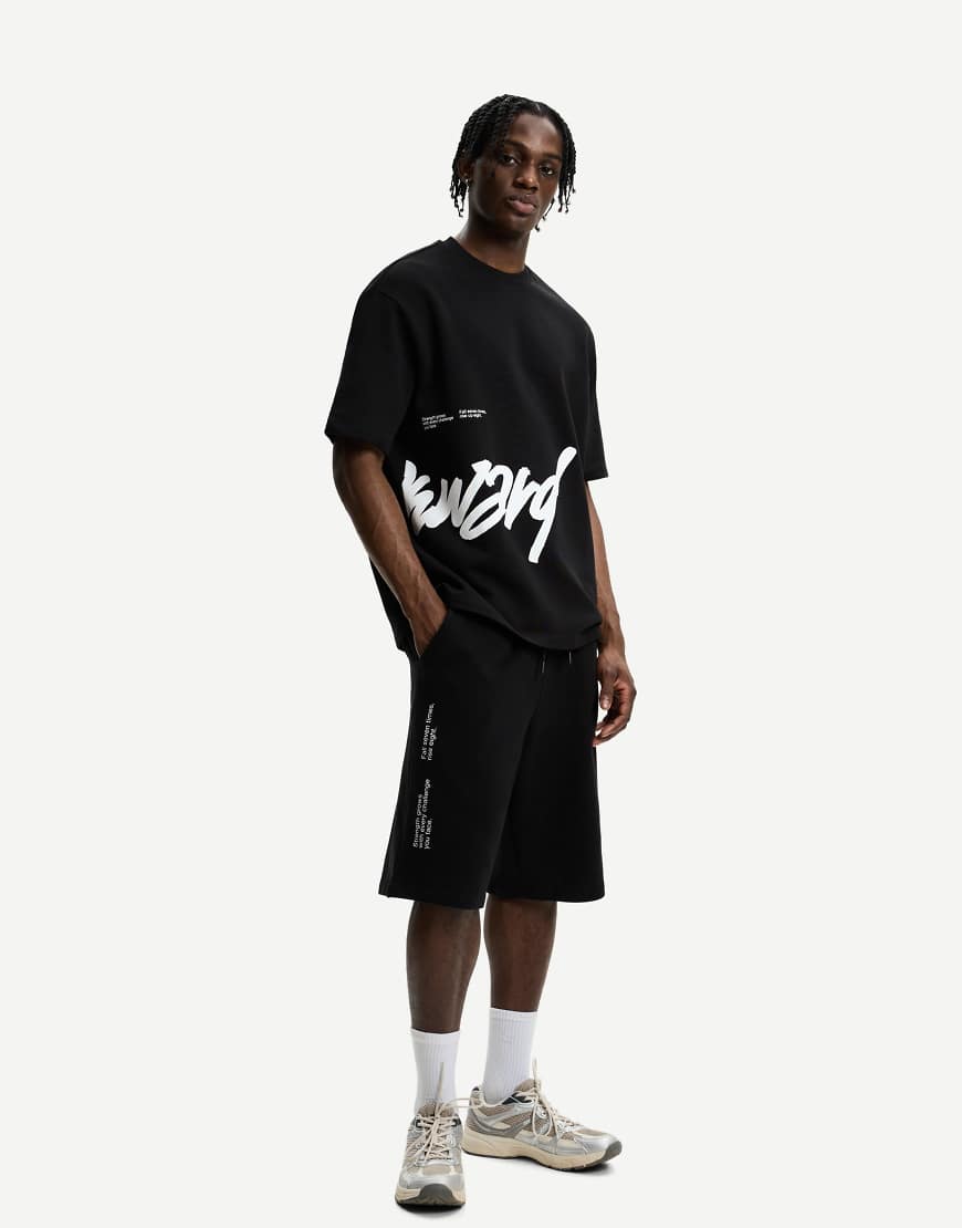 Bershka - Weiche Bermuda-Shorts in Schwarz mit Print Bershka - Weiche Bermuda-Shorts in Schwarz mit Print von Bershka