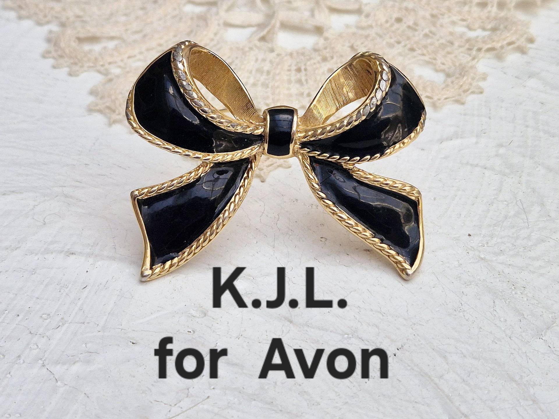 Kenneth Jay Lane Für Avon Vintage Schleifenbrosche in Goldton Mit Schwarzer Emaille. Signiert K.j.l von BestAntiqueBoutique