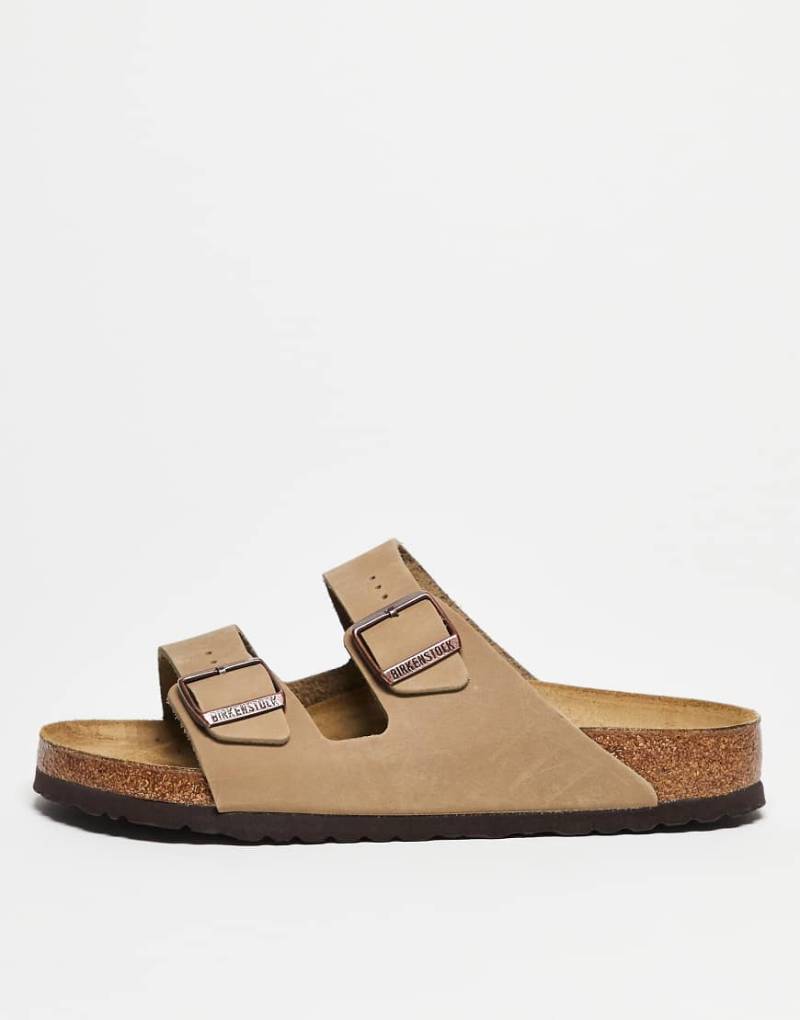 Birkenstock ‑ Arizona ‑ Unisex-Sandalen aus geöltem Leder in Tabakbraun Birkenstock ‑ Arizona ‑ Unisex-Sandalen aus geöltem Leder in Tabakbraun von Birkenstock