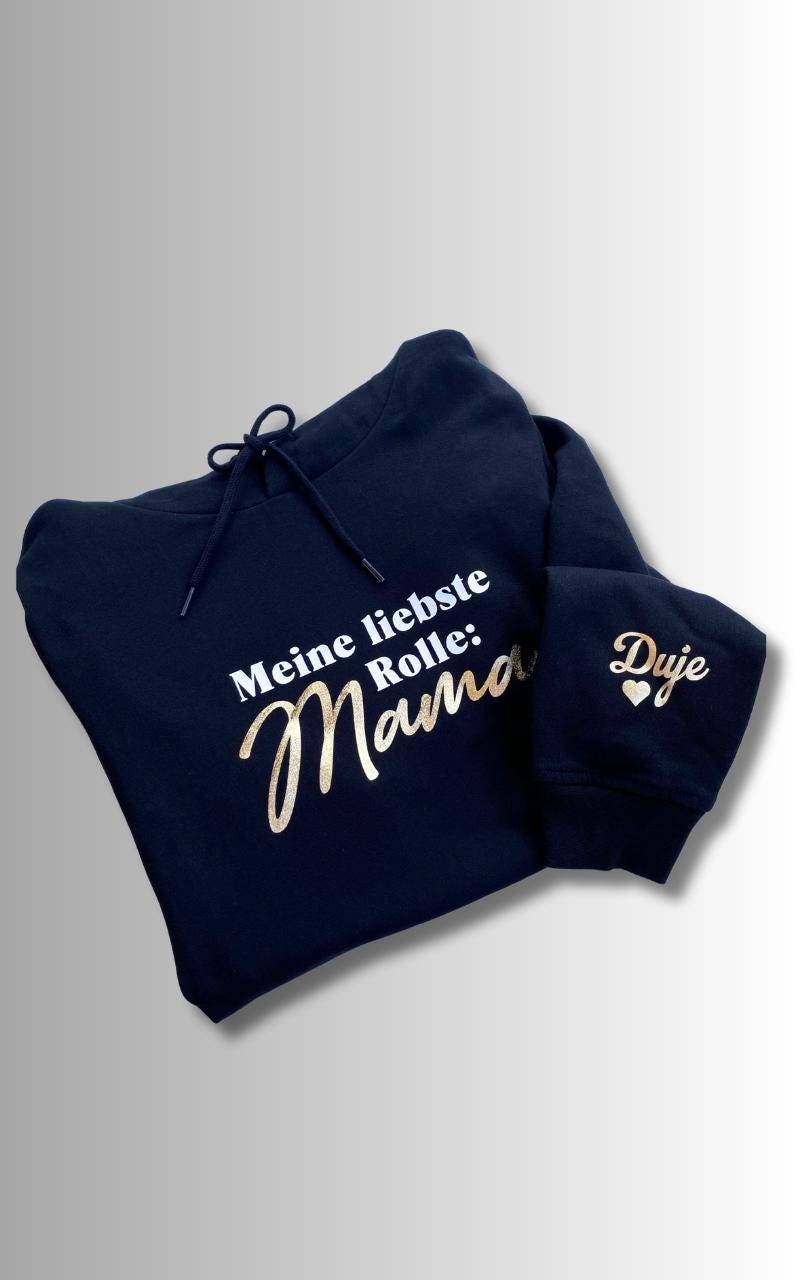 Mama Pullover - Personalisierter Kapuzenpullover Mit Weißem Oder Goldenem Glitzer-Schriftzug Und Namensdruck Am Ärmel Geschenkidee von Blesolinaa