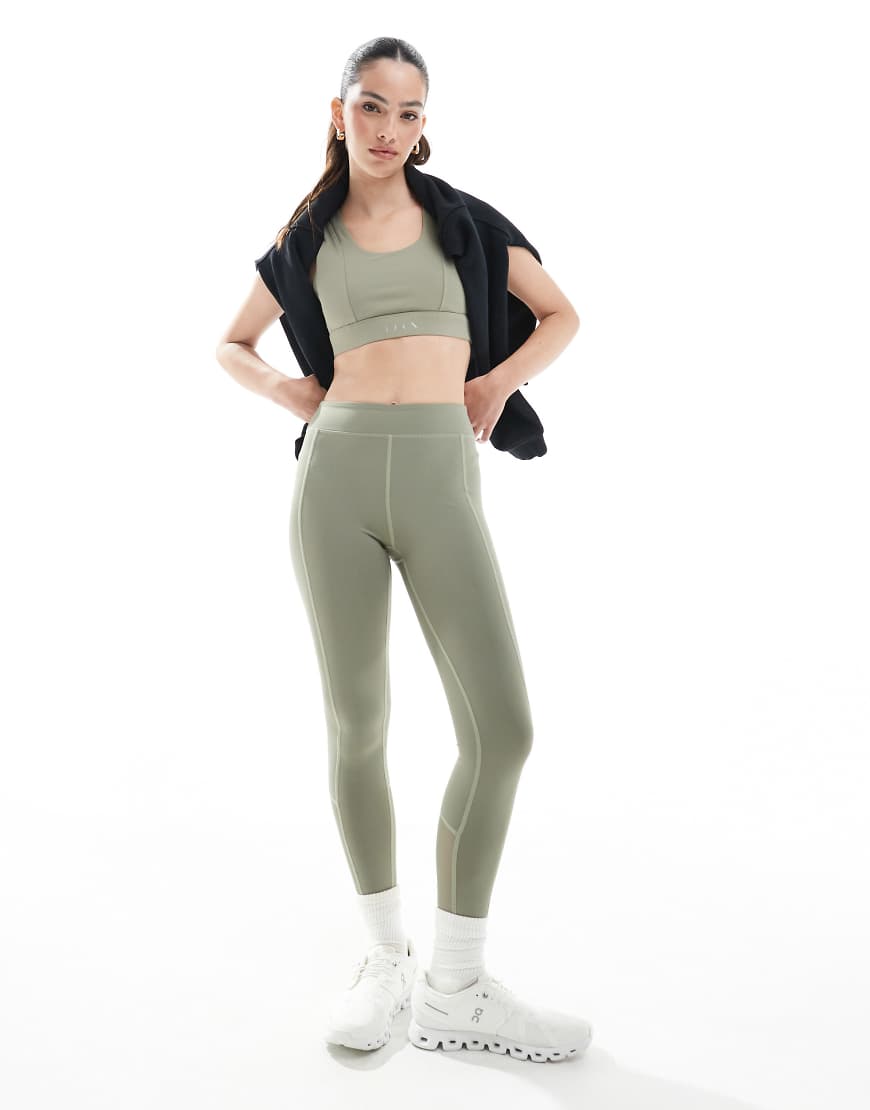 Born Living Yoga - Namir - 7/8-Leggings in Camuflaje mit Netzstoff-Design-Grün Born Living Yoga - Namir - 7/8-Leggings in Camuflaje mit Netzstoff-Design-Grün von Born Living Yoga