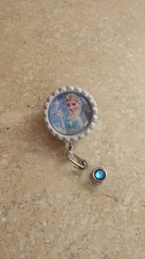 Frozen Elsa Abzeichen-Roller Schneekönigin Metall-Krokodilklemme Frozen Elsa Abzeichen-Roller Schneekönigin Metall-Krokodilklemme von BottleCapsGaloreNMor