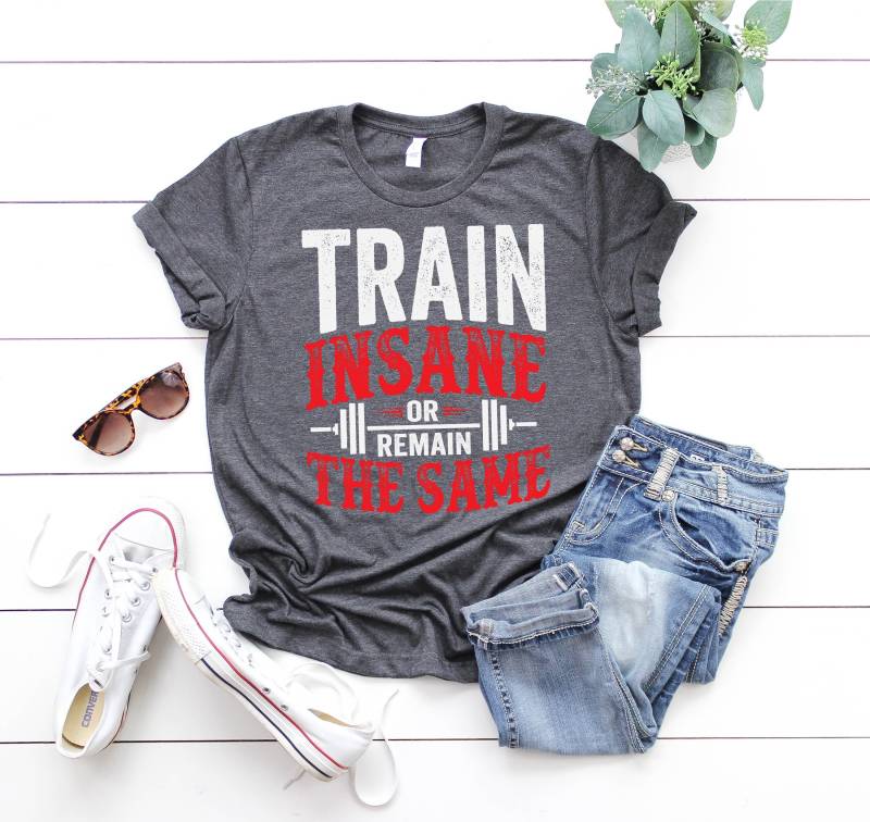 Zug Verrückt Oder Bleiben Die Gleichen - Gewichtheber Persönlichen Trainer Kurzarm Unisex T-Shirt von BoulderDesignStudio