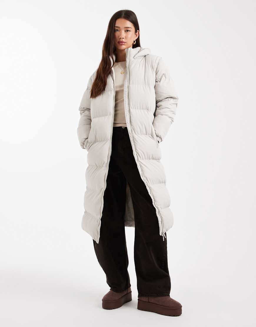 Brave Soul - Wattierte Maxi-Jacke in Stein mit Kapuze und abnehmbaren Ärmeln-Neutral Brave Soul - Wattierte Maxi-Jacke in Stein mit Kapuze und abnehmbaren Ärmeln-Neutral von Brave Soul