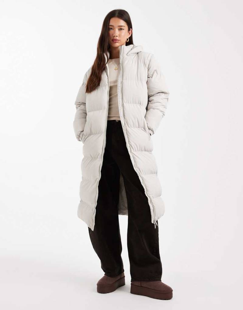 Brave Soul - Wattierte Maxi-Jacke in Stein mit Kapuze und abnehmbaren Ärmeln-Neutral von Brave Soul