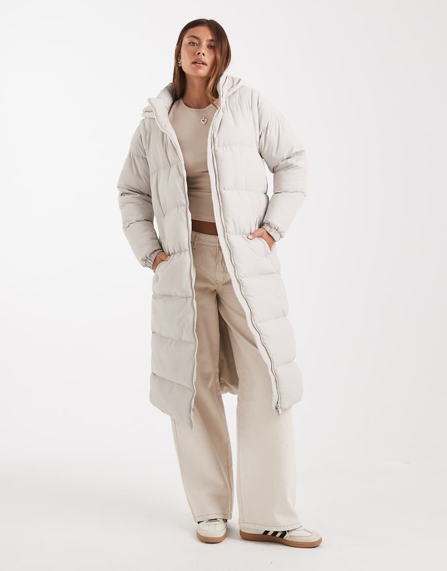 Brave Soul - Wattierte Maxi-Jacke in Stein mit Kapuze und abnehmbaren Ärmeln-Neutral Brave Soul - Wattierte Maxi-Jacke in Stein mit Kapuze und abnehmbaren Ärmeln-Neutral von Brave Soul
