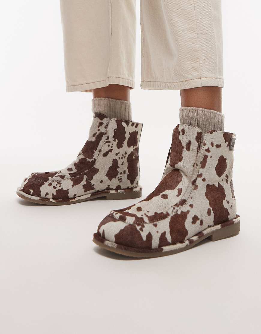 Bronx - Flauschige, gemütliche Stiefel aus Wildleder mit Kuhfellmuster-Gelb Bronx - Flauschige, gemütliche Stiefel aus Wildleder mit Kuhfellmuster-Gelb von Bronx