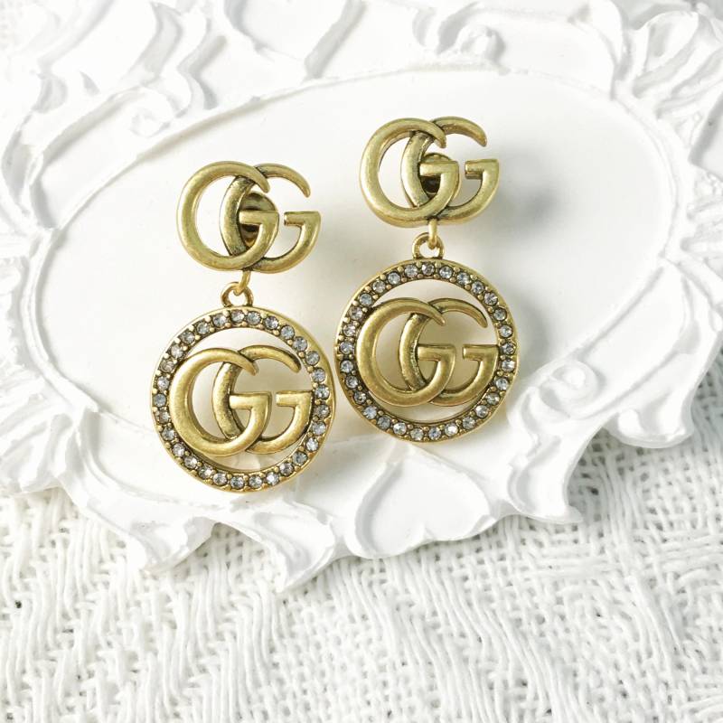 Vintage Gucci Zirkon Messing Tropfen Ohrringe Vintage Gucci Zirkon Messing Tropfen Ohrringe von BurkhardAcenachplace