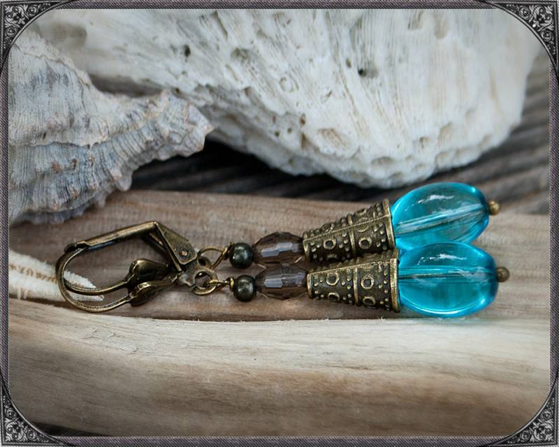 Hellblaue Boho Ohrhänger von ButterflyLotusShop