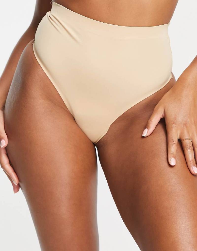 Bye Bra - Unsichtbarer, formender Tanga in Beige mit mittelhohem Bund-Neutral von Bye Bra