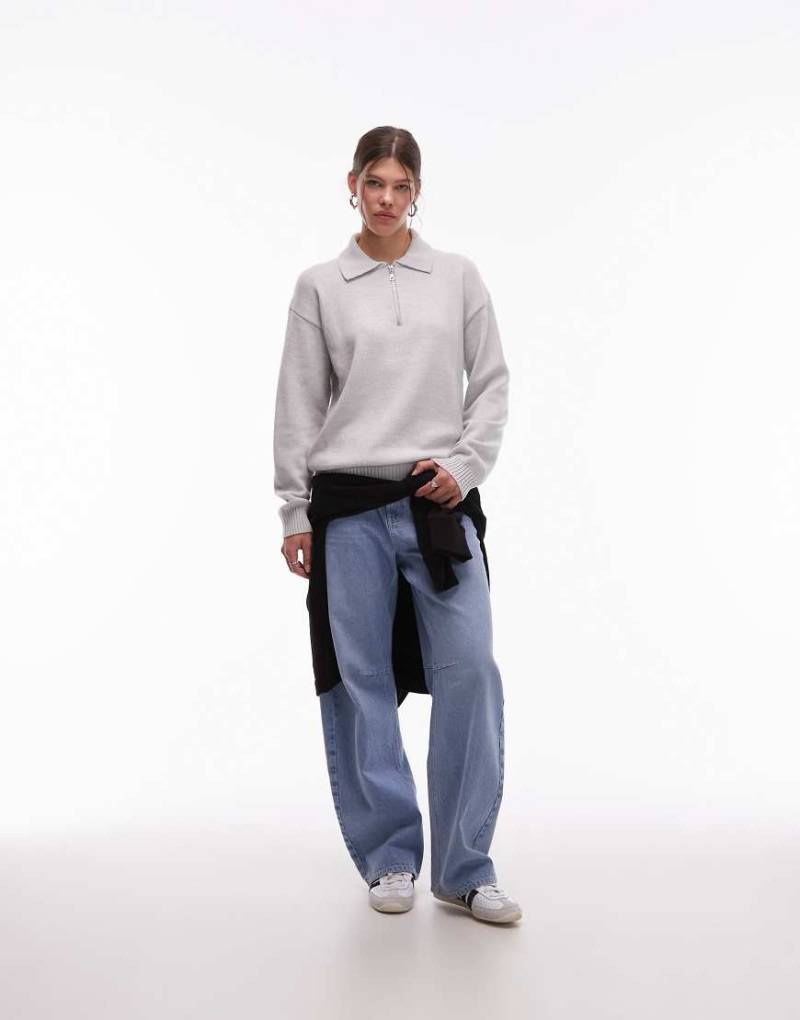 CAT - WWR - Loose-Fit-Polohemd aus Strick in Hellgrau mit kurzem Reißverschluss CAT - WWR - Loose-Fit-Polohemd aus Strick in Hellgrau mit kurzem Reißverschluss von CAT WWR