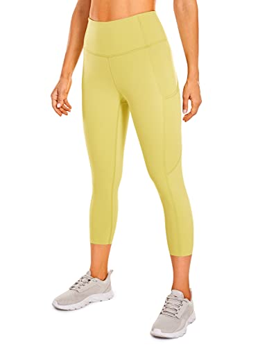 CRZ YOGA Damen Capri Yoga Leggings Hohe Taille Sporthose Elastisch Joggen Leggings mit Tasche - Naked Feeling - 48cm Lemon Yellow 40 von CRZ YOGA