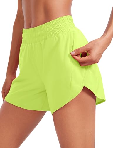 CRZ YOGA Damen Kurze Sporthose Mid Waist Laufhose Fitness Gym Kurz Hose Sportshorts mit Reißverschlusstasche Neon Gelb 34 von CRZ YOGA