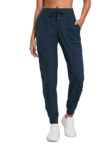 CRZ YOGA Damen Tapered Jogginghose Reisen Falten Sporthose Freizeithose Jogger Hosen mit Kordelzug und Taschen - 72cm Tinte Blau 34 von CRZ YOGA