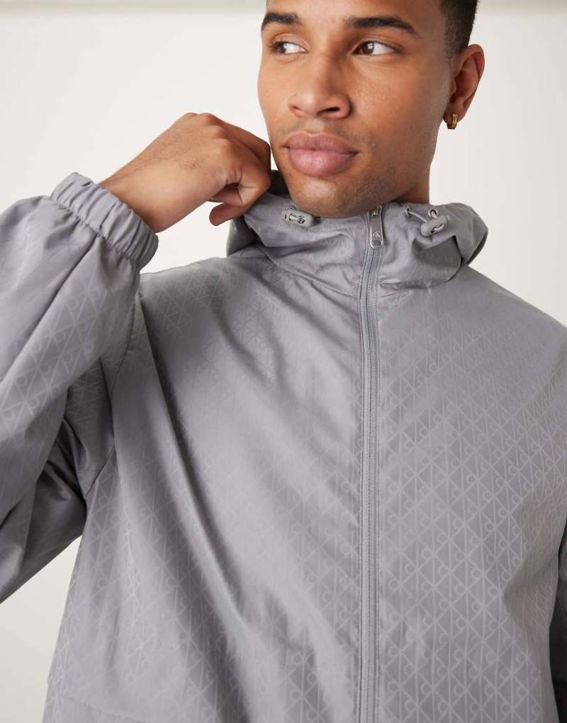 Calvin Klein Jeans - Gemusterte Windjacke aus Nylon in Grau von Calvin Klein Jeans