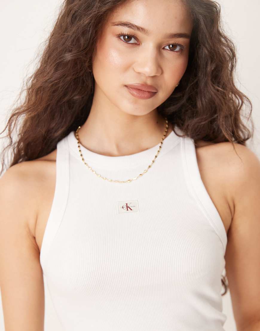 Calvin Klein Jeans - Geripptes Tanktop in Weiß mit Logo-Etikett aus Webstoff von Calvin Klein Jeans