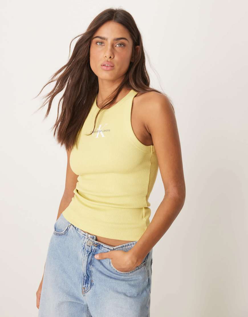 Calvin Klein Jeans - Geripptes Trägertop in Gelb mit Monogramm-Logo Calvin Klein Jeans - Geripptes Trägertop in Gelb mit Monogramm-Logo von Calvin Klein Jeans