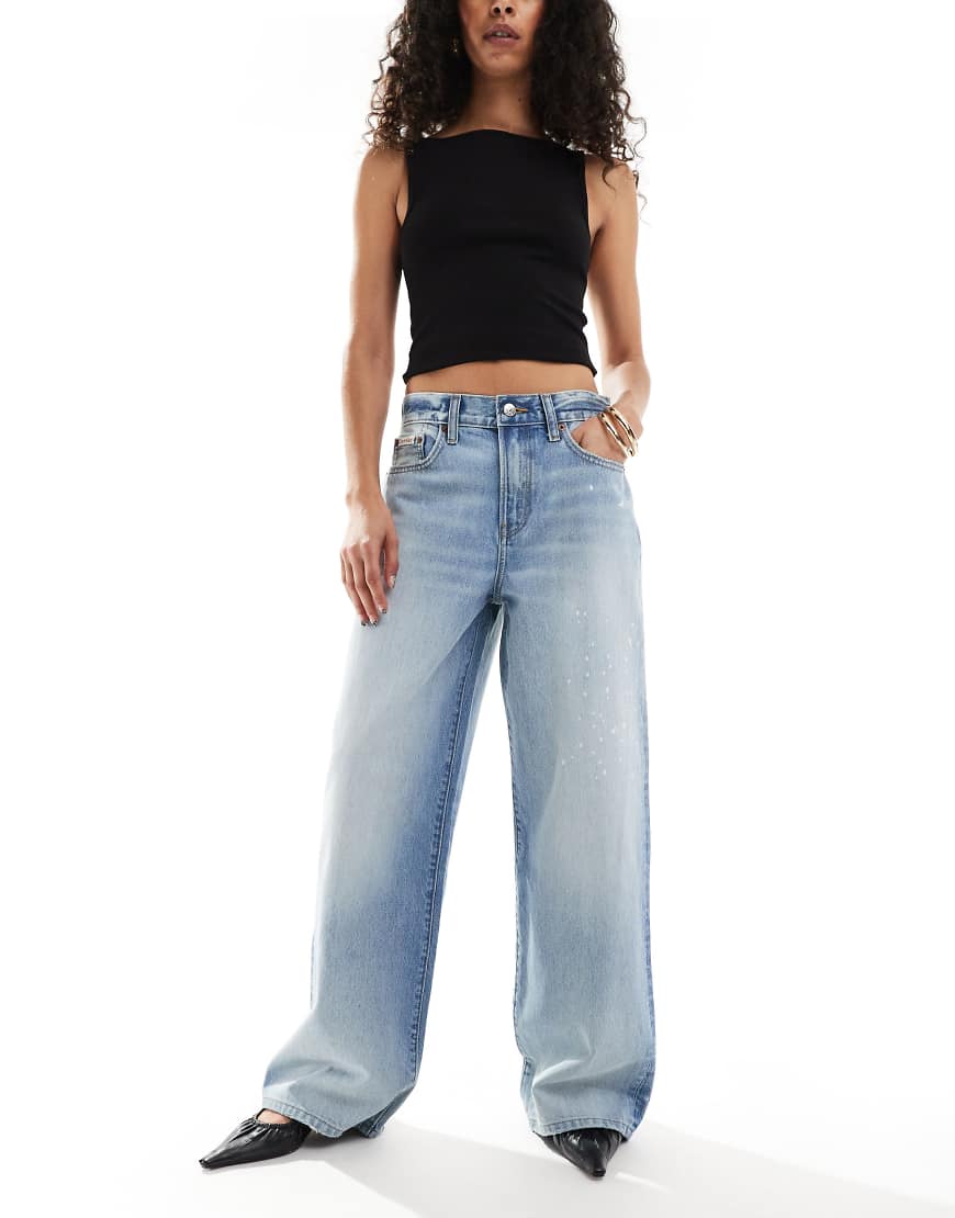 Calvin Klein Jeans - Jeans in Acid-Waschung mit weitem Bein und Splatter-Print-Blau Calvin Klein Jeans - Jeans in Acid-Waschung mit weitem Bein und Splatter-Print-Blau von Calvin Klein Jeans
