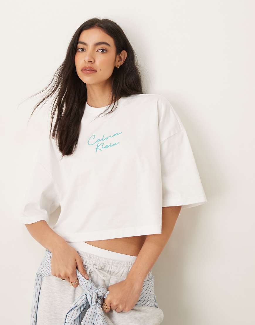 Calvin Klein Jeans - Kastiges Cropped-Trägertop in gestreiftem Weiß mit Logo von Calvin Klein Jeans