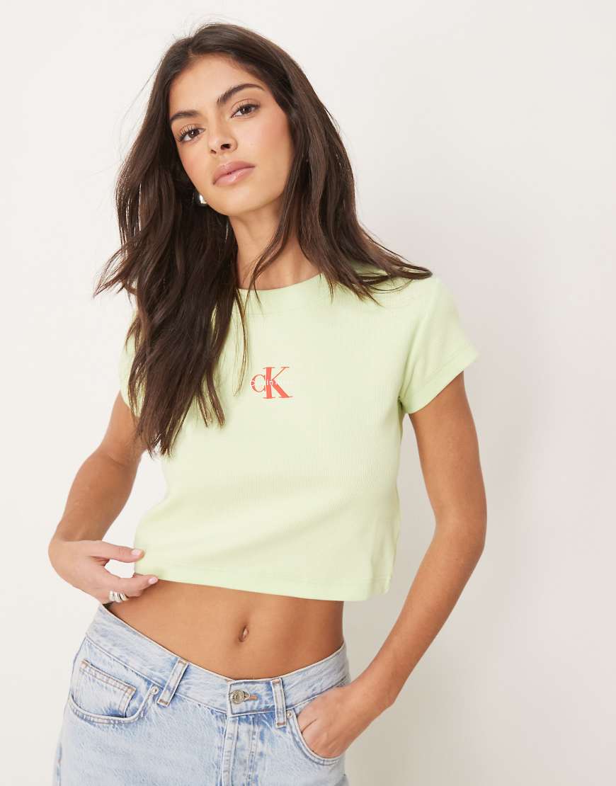 Calvin Klein Jeans - Knapp geschnittenes T-Shirt in Limettengrün mit schwarz-weißem Logo Calvin Klein Jeans - Knapp geschnittenes T-Shirt in Limettengrün mit schwarz-weißem Logo von Calvin Klein Jeans
