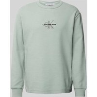 Calvin Klein Jeans Longsleeve mit Label-Stitching in Stein, Größe L Calvin Klein Jeans Longsleeve mit Label-Stitching in Stein, Größe L von Calvin Klein Jeans