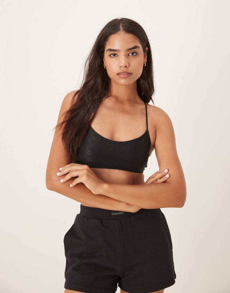 Calvin Klein Jeans - Netzstoff-Bustier in Schwarz mit Monogramm-Muster von Calvin Klein Jeans