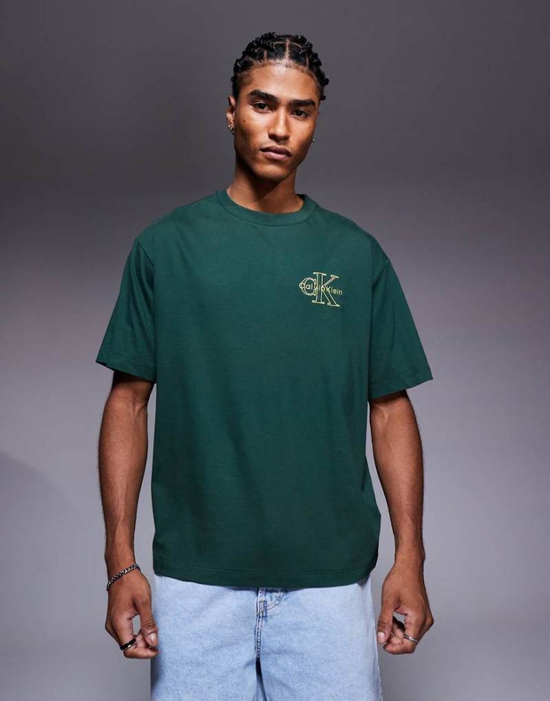 Calvin Klein Jeans - Outline Monologo - T-Shirt in Tanngrün von Calvin Klein Jeans