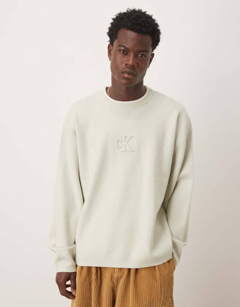 Calvin Klein Jeans - Pullover in grüner Tönung mit mittiger Logo-Prägung von Calvin Klein Jeans