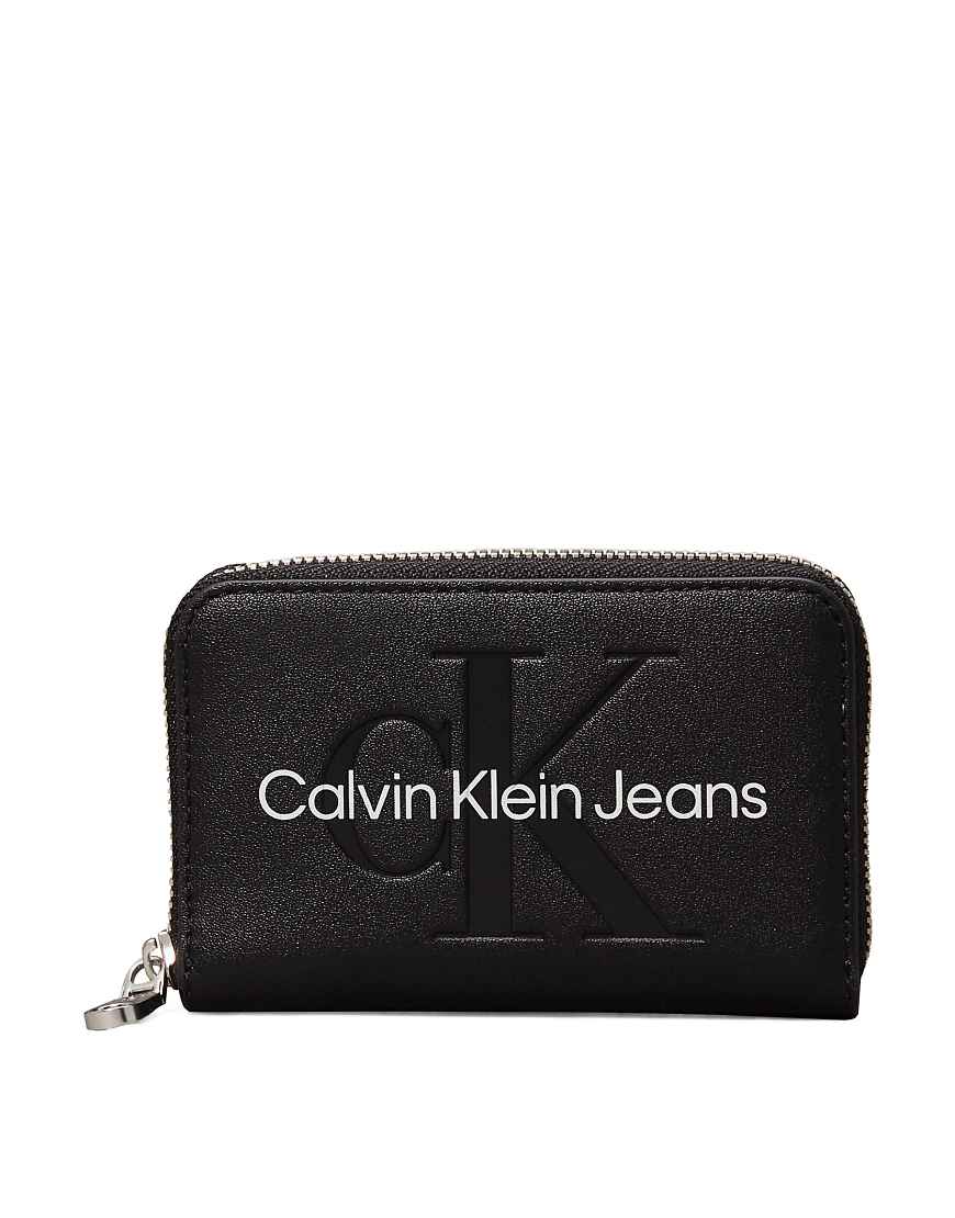 Calvin Klein Jeans - RFID-Geldbörse in Schwarz mit umlaufendem Reißverschluss Calvin Klein Jeans - RFID-Geldbörse in Schwarz mit umlaufendem Reißverschluss von Calvin Klein Jeans