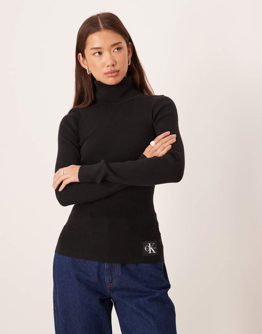 Calvin Klein Jeans - Rollkragenpullover in Schwarz Calvin Klein Jeans - Rollkragenpullover in Schwarz von Calvin Klein Jeans