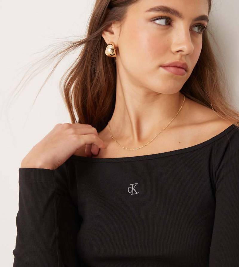 Calvin Klein Jeans - Schulterfreies Oberteil in Schwarz, exklusiv bei ASOS von Calvin Klein Jeans