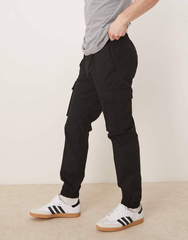 Calvin Klein Jeans - Skinny Fit Hose aus elastischem Ripstop in Schwarz von Calvin Klein Jeans