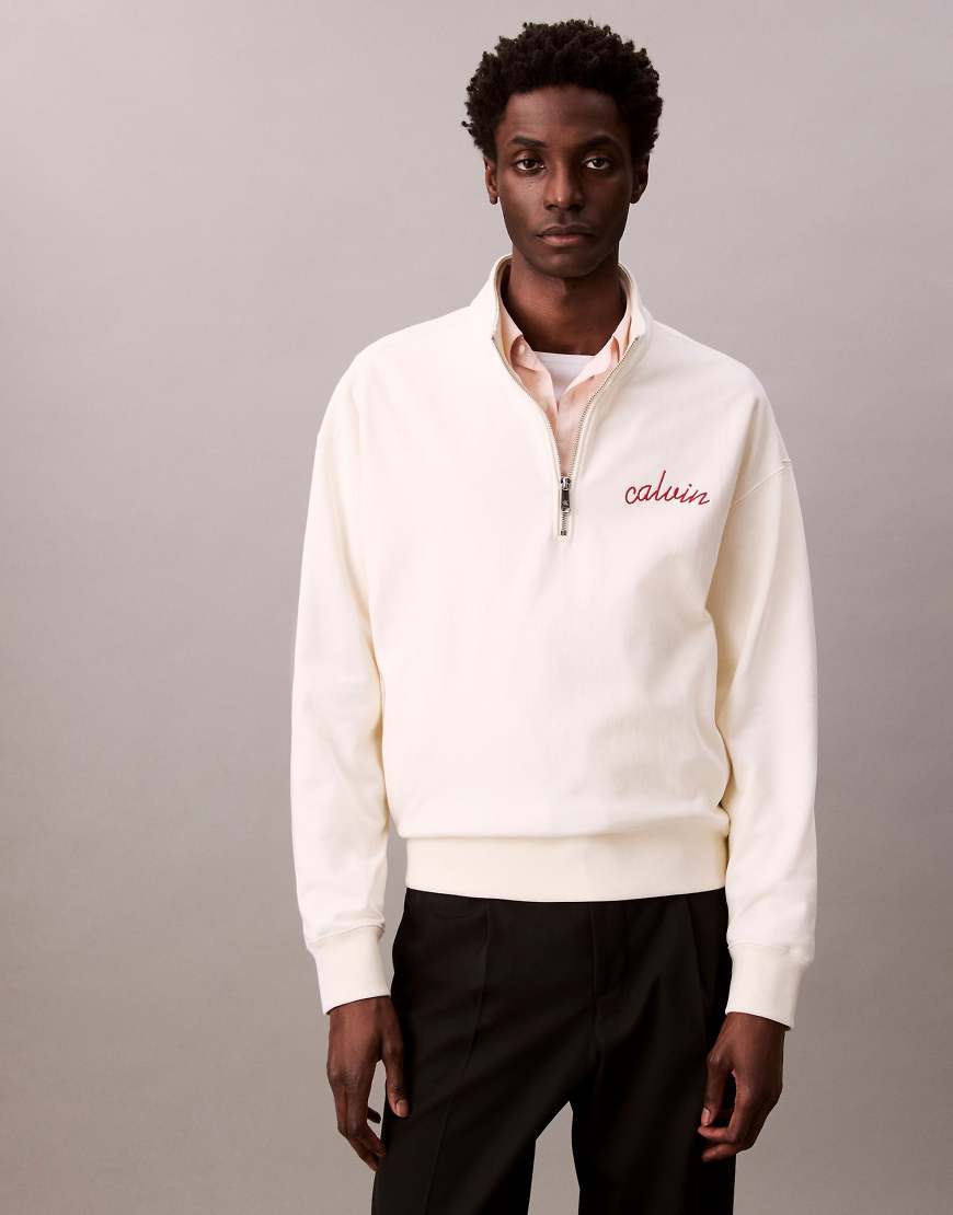 Calvin Klein Jeans - Sweatshirt in Wollweiß mit Logo-Stickerei auf der Brust und kurzem Reißverschluss Calvin Klein Jeans - Sweatshirt in Wollweiß mit Logo-Stickerei auf der Brust und kurzem Reißverschluss von Calvin Klein Jeans