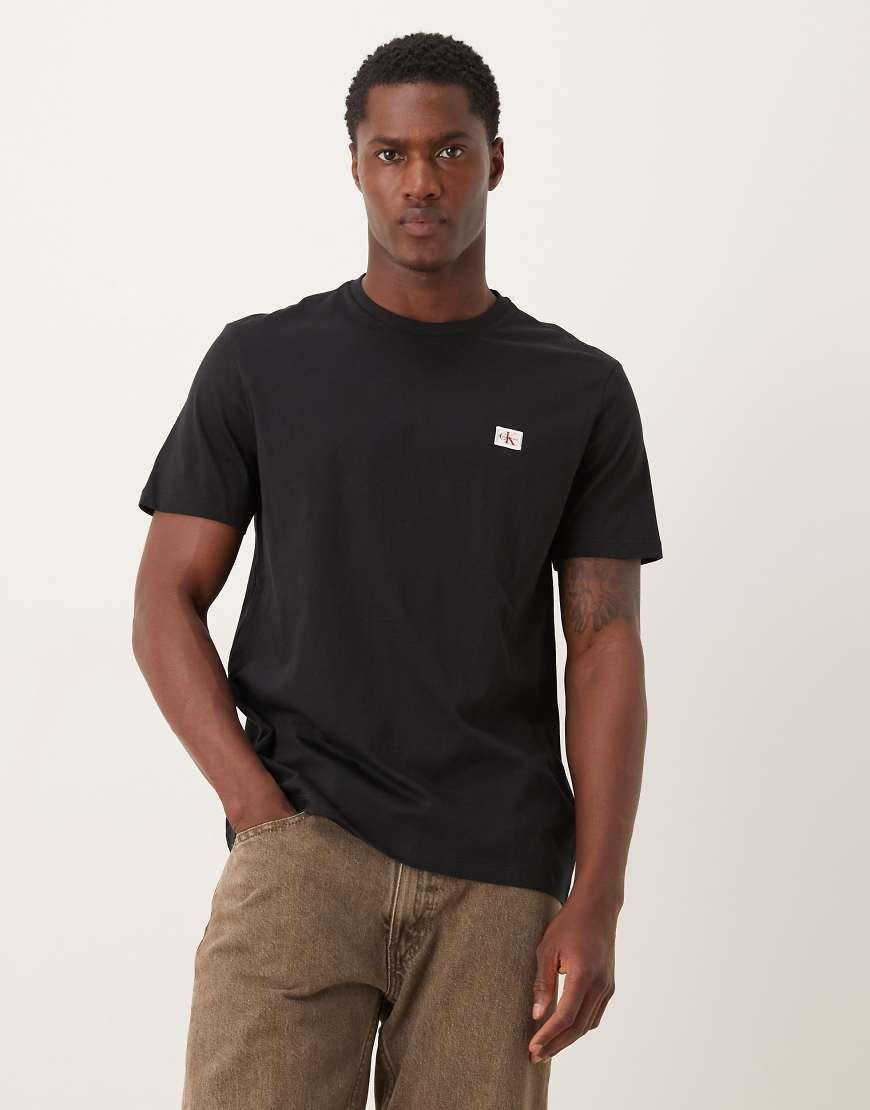 Calvin Klein Jeans - T-Shirt in Schwarz mit Logo-Aufnäher von Calvin Klein Jeans