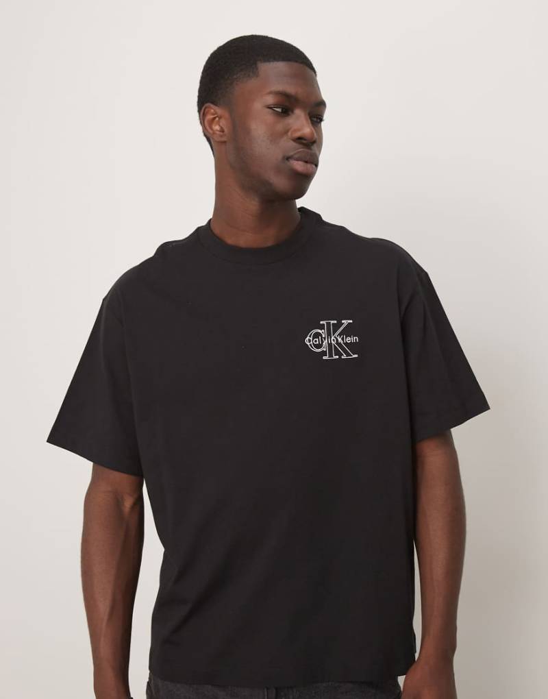 Calvin Klein Jeans - T-Shirt in Schwarz mit Monogramm-Logo auf der Brust von Calvin Klein Jeans