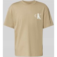 Calvin Klein Jeans T-Shirt mit Label-Print und Rundhalsausschnitt in Beige, Größe XXL Calvin Klein Jeans T-Shirt mit Label-Print und Rundhalsausschnitt in Beige, Größe XXL von Calvin Klein Jeans