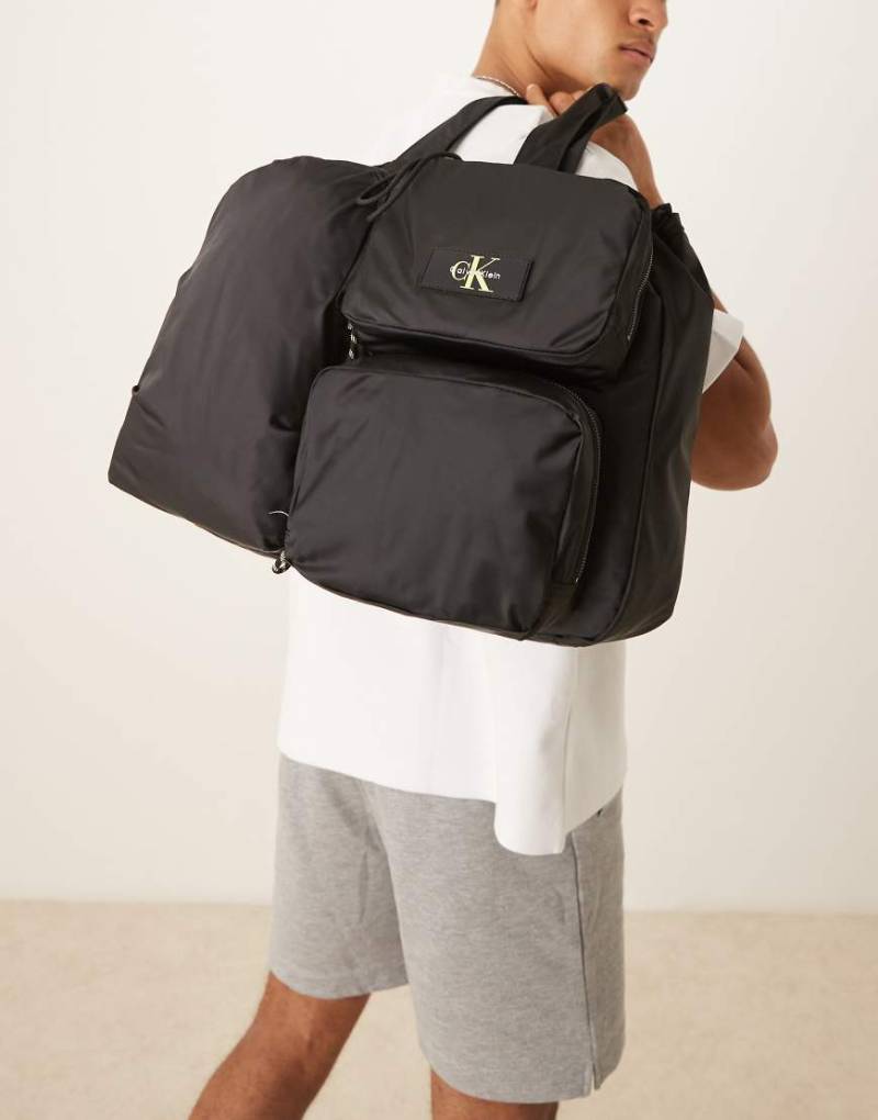 Calvin Klein Jeans - Tragetasche in Schwarz mit Utility-Flair von Calvin Klein Jeans