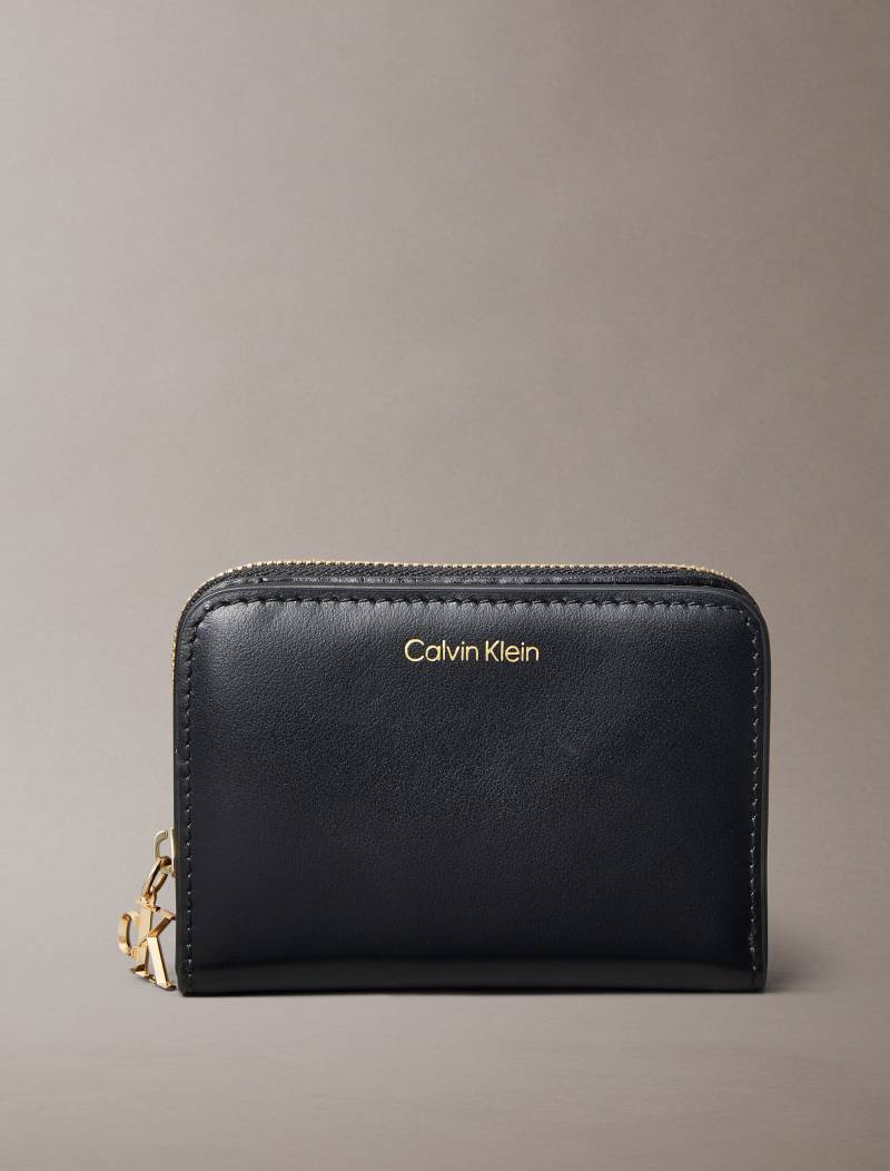 Calvin Klein Geldbörse "CK PULLER MEDIUM FLAP ZIP AROUND" Damen Geldbörse, Portemonnaie mit CK-Logo von Calvin Klein