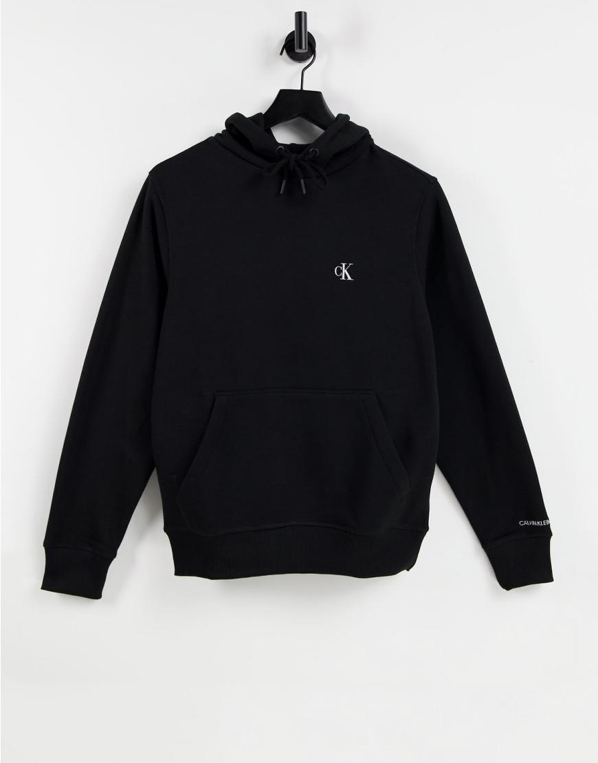 Calvin Klein Jeans - Essential - Kapuzenpullover in Schwarz in regulärer Passform mit CK-Logo von Calvin Klein