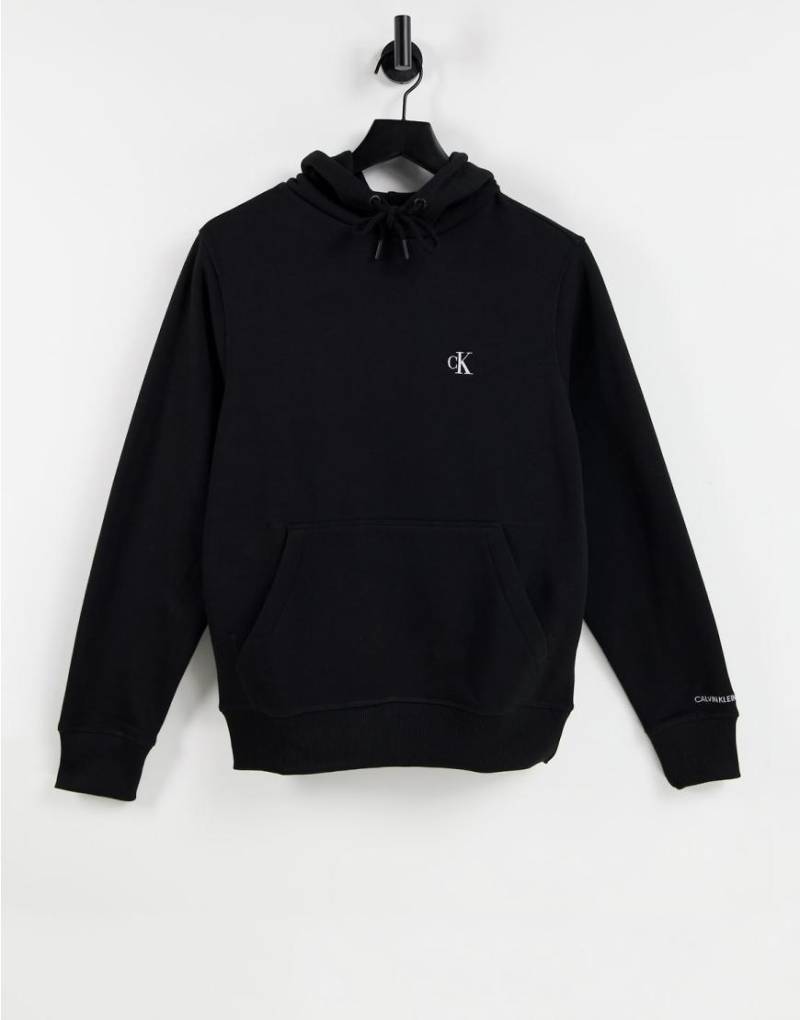 Calvin Klein Jeans - Essential - Kapuzenpullover in Schwarz in regulärer Passform mit CK-Logo von Calvin Klein