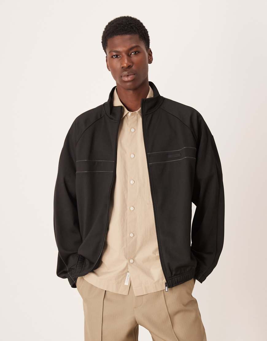 Calvin Klein Jeans - Leichte Windjacke in Schwarz mit Reißverschluss von Calvin Klein