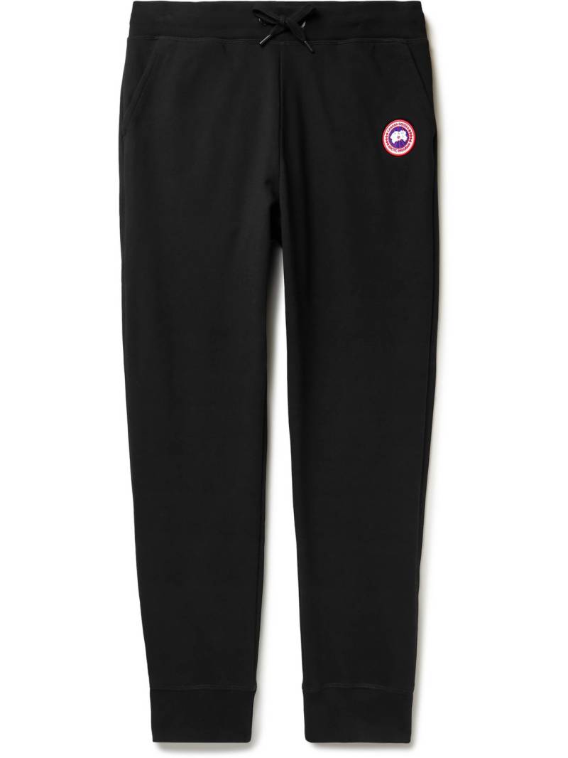 Canada Goose - Huron Tapered Logo-Appliquéd Cotton-Jersey Sweatpants - Men - Black - S von Canada Goose