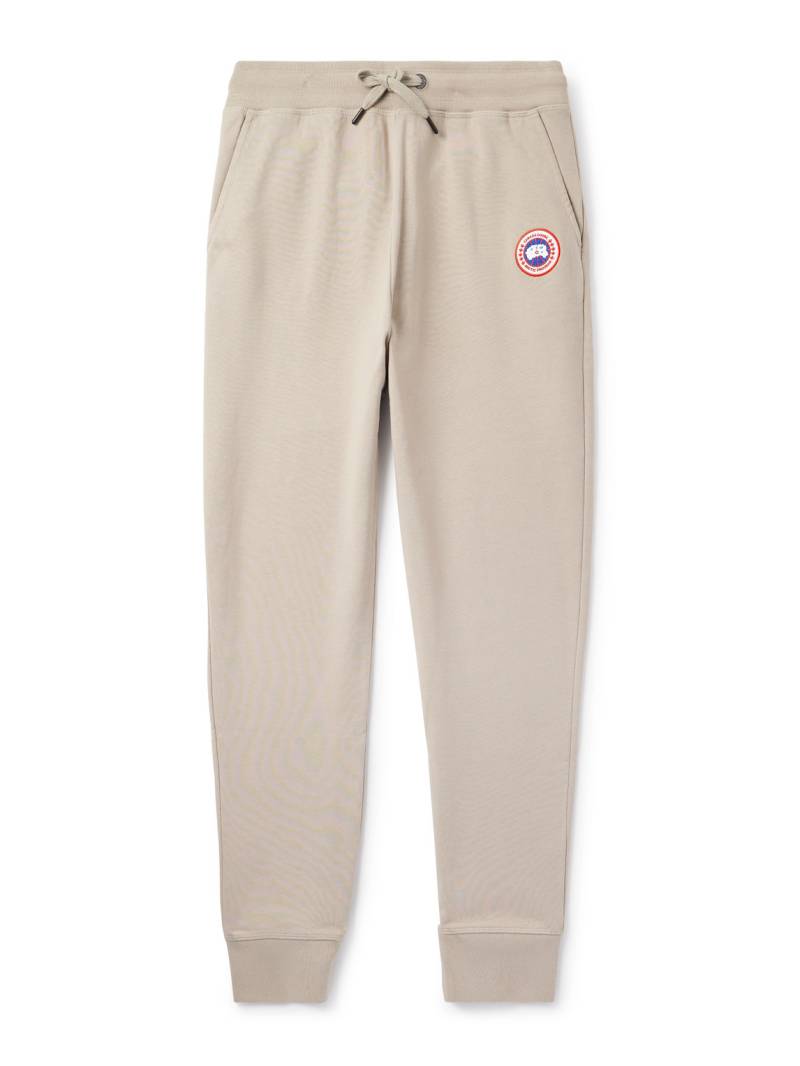 Canada Goose - Huron Tapered Logo-Appliquéd Cotton-Jersey Sweatpants - Men - Neutrals - XS von Canada Goose