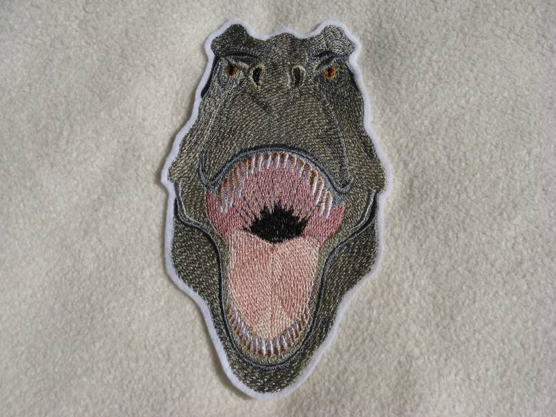 Dino T-Rex Kopf Applikation Gross in Wunschfarbe von CareweZauberstern