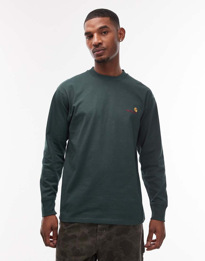 Carhartt WIP - American - Langärmliges T-Shirt in Grün mit Schriftzug von Carhartt WIP