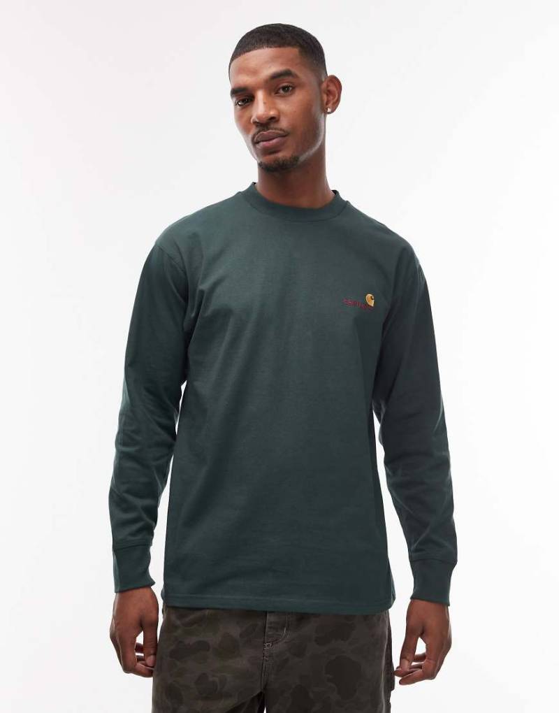 Carhartt WIP - American - Langärmliges T-Shirt in Grün mit Schriftzug von Carhartt WIP