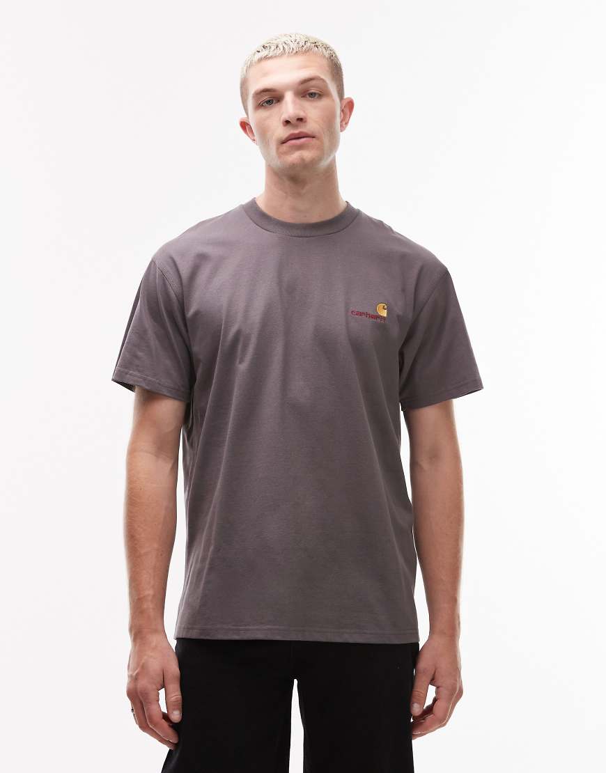 Carhartt WIP - American - T-Shirt in Grau mit Schriftzug Carhartt WIP - American - T-Shirt in Grau mit Schriftzug von Carhartt WIP